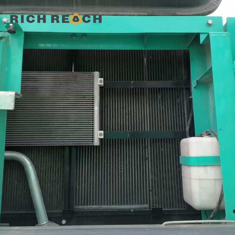 Air filter and cooling system of a 2017 Kobelco SK350LC excavator, priced at $34,722